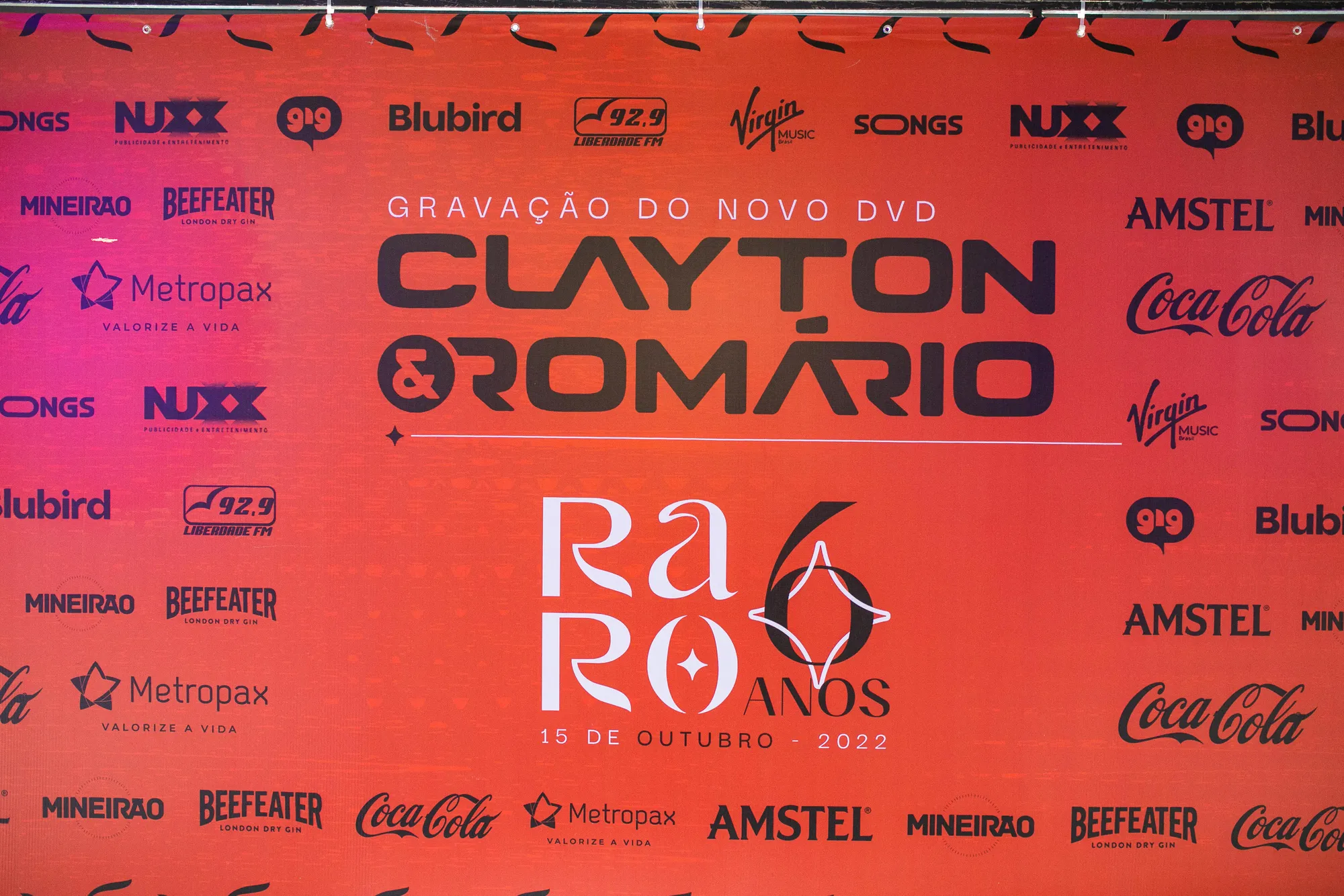 Ativação Amstel · Coca-Cola · Beefeater · Metropax · Virgin Music · Songs em RARO 06 anos + DVD Clayton & Romário